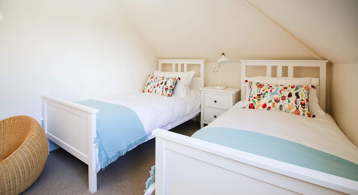 Please be mindful of the sloping ceiling in bedroom 2.