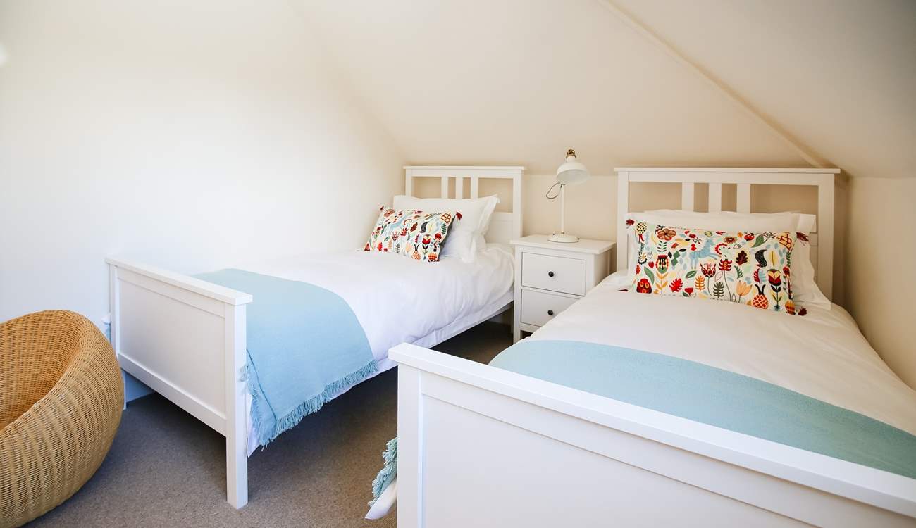 Please be mindful of the sloping ceiling in bedroom 2.