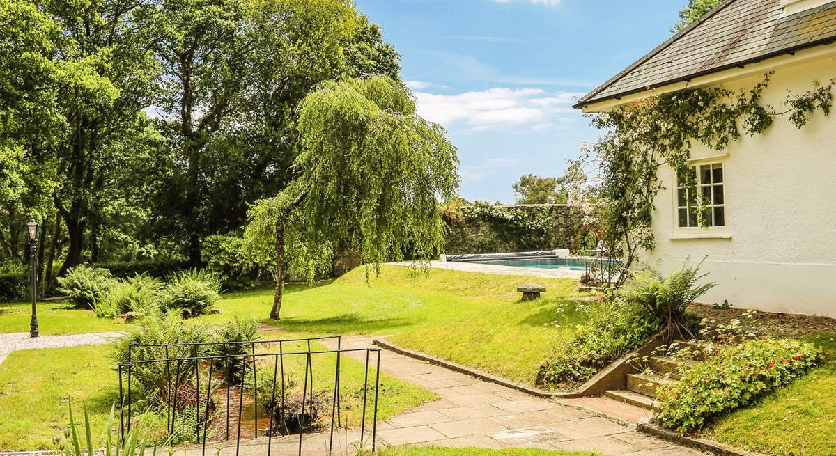 Please be mindful of little ones when crossing the stream and playing in the extensive grounds.