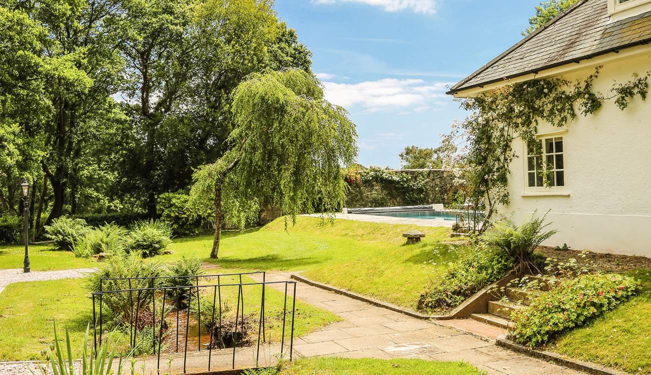 Please be mindful of little ones when crossing the stream and playing in the extensive grounds.