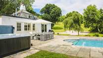 The glorious swimming pool, hot tub and superb rolling countryside setting makes holidaying at this beautiful cottage rather special.