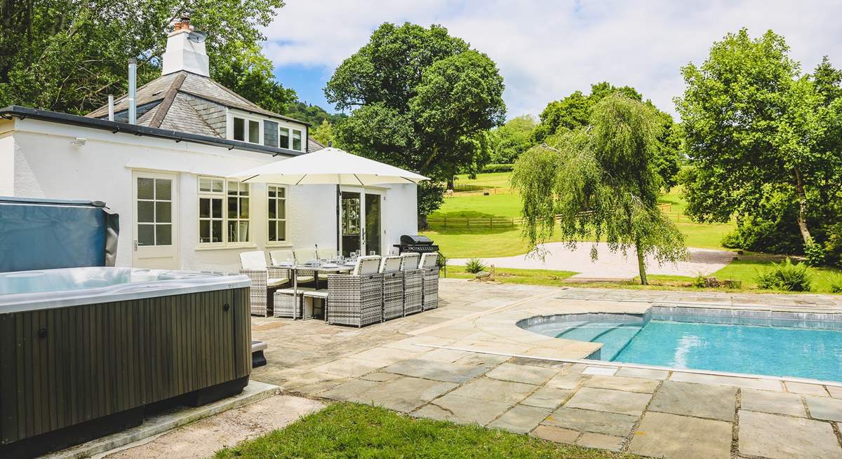 The glorious swimming pool, hot tub and superb rolling countryside setting makes holidaying at this beautiful cottage rather special.