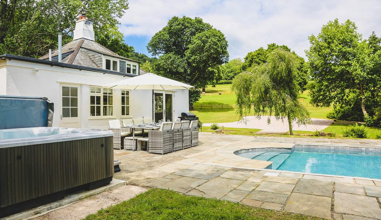 The glorious swimming pool, hot tub and superb rolling countryside setting makes holidaying at this beautiful cottage rather special.