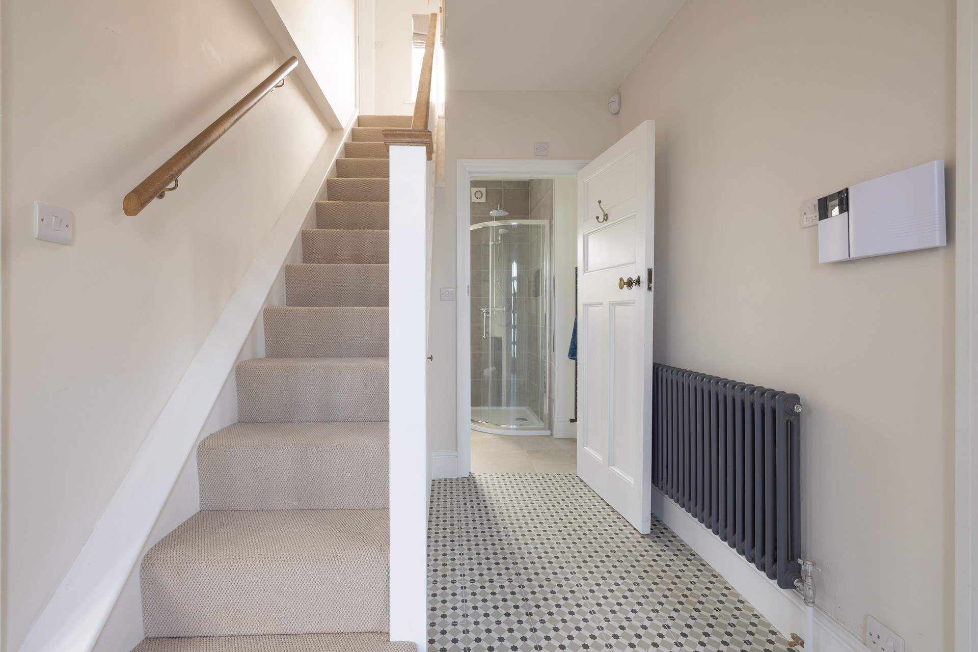 Stairs lead to the first floor.