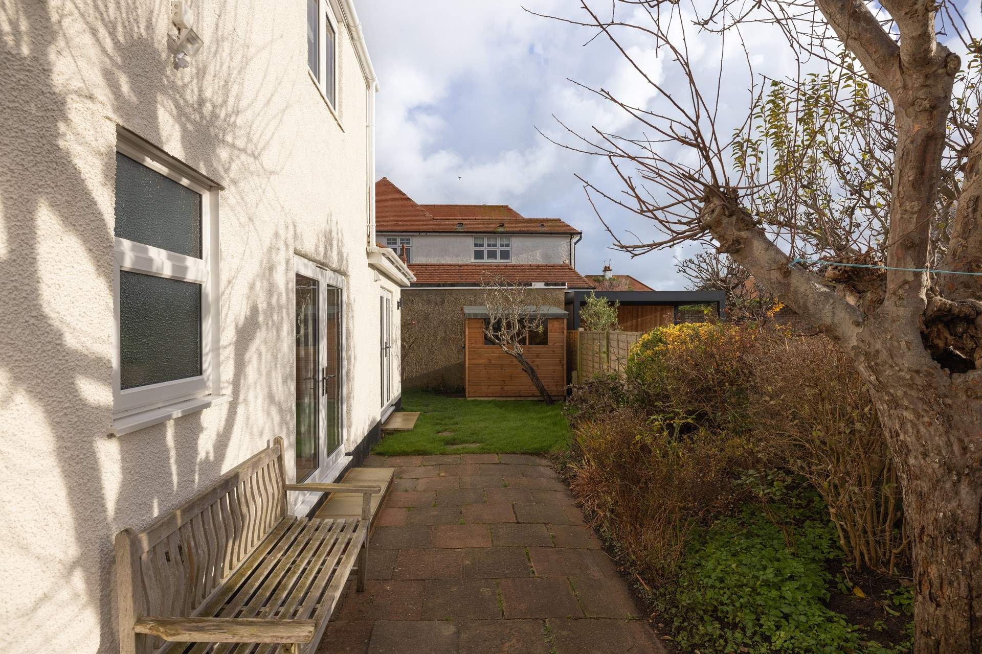 A small patio and garden area sits behind the house. New garden furniture and photos to follow.