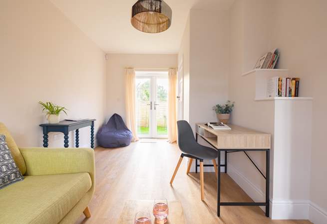 With a table-come-writing desk should you need to catch up on some work.