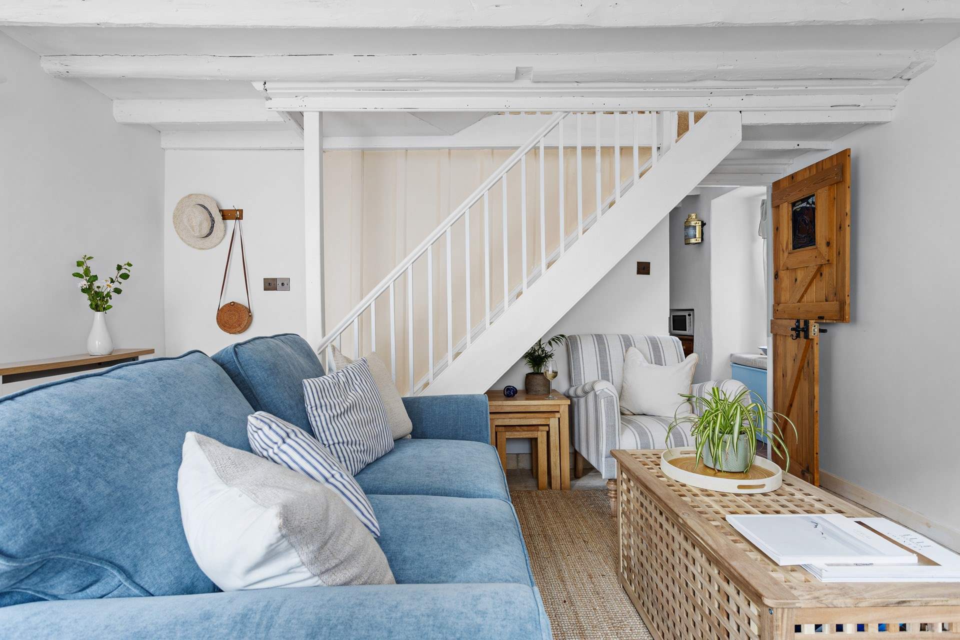 The cottage sitting-room is set to welcome you.