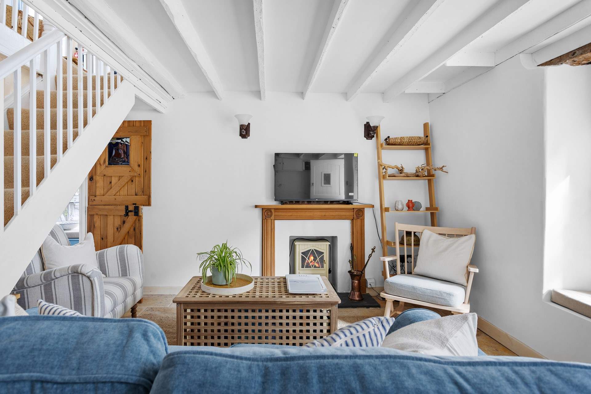 The exposed beams and stable-doors add to the overall character.