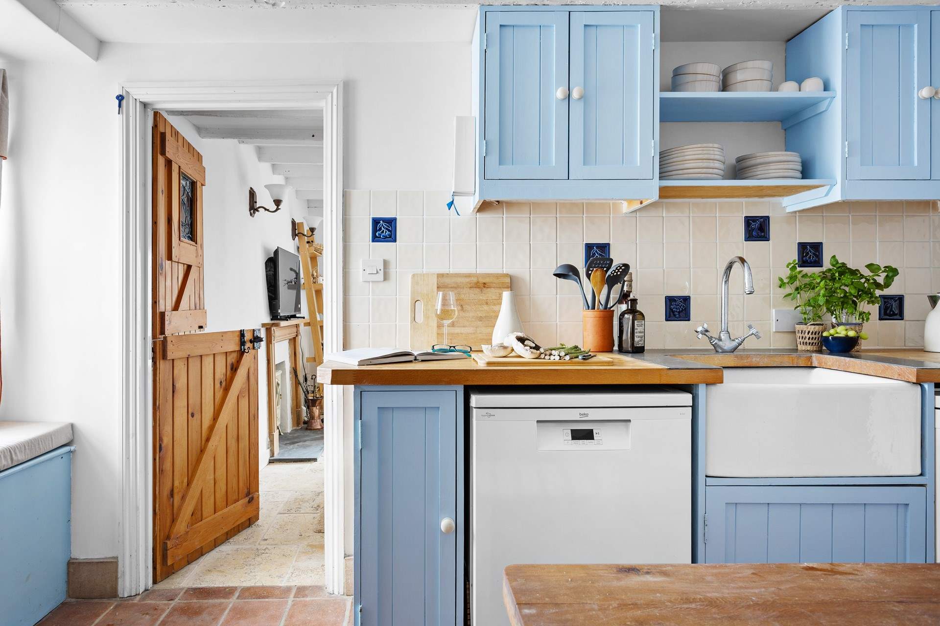 Complete with Belfast sink and a stable-door leading into the sitting-room.