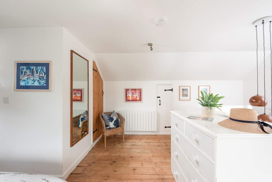The principal bedroom spreads over the whole of the top floor.