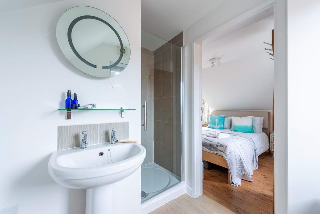 This bedroom has its own en suite shower-room.