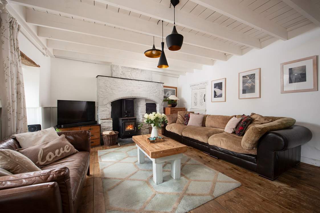 What a cosy charming sitting-room to relax in together.