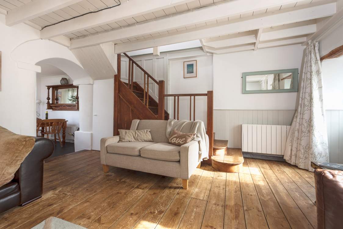The sitting-room leads through to the kitchen/diner.