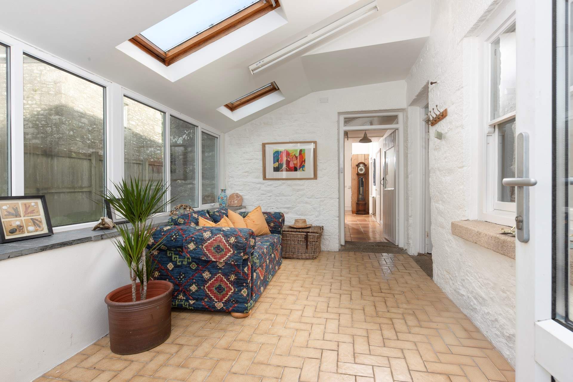 The farmhouse has a conservatory at the back of the property, this is an excellent boot-room to leave your sandy shoes behind.