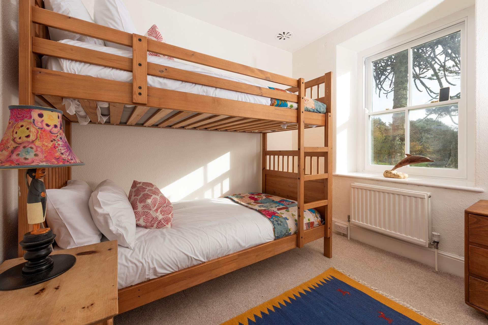Bedroom 3 has sweet bunk-beds overlooking the garden.