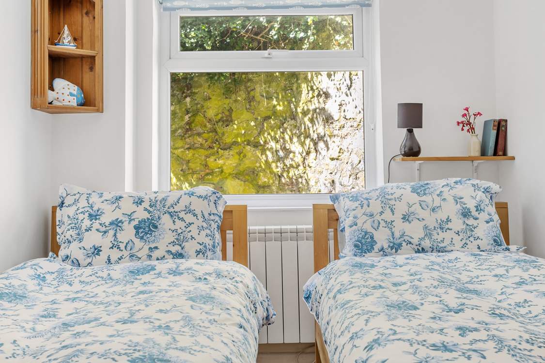 The ground floor bedrooms look out onto your private courtyard, which is handy for drying wetsuits.