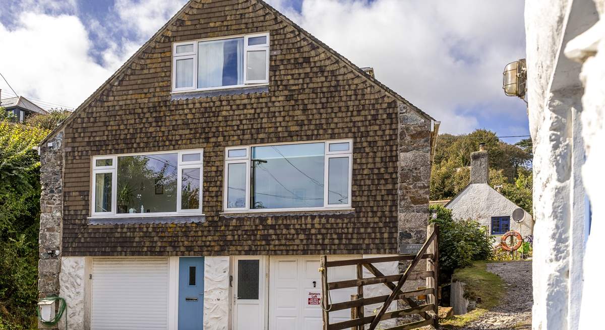 Converted from a traditional Cornish pilchard loft, Tea By The Sea is the apartment on the right.