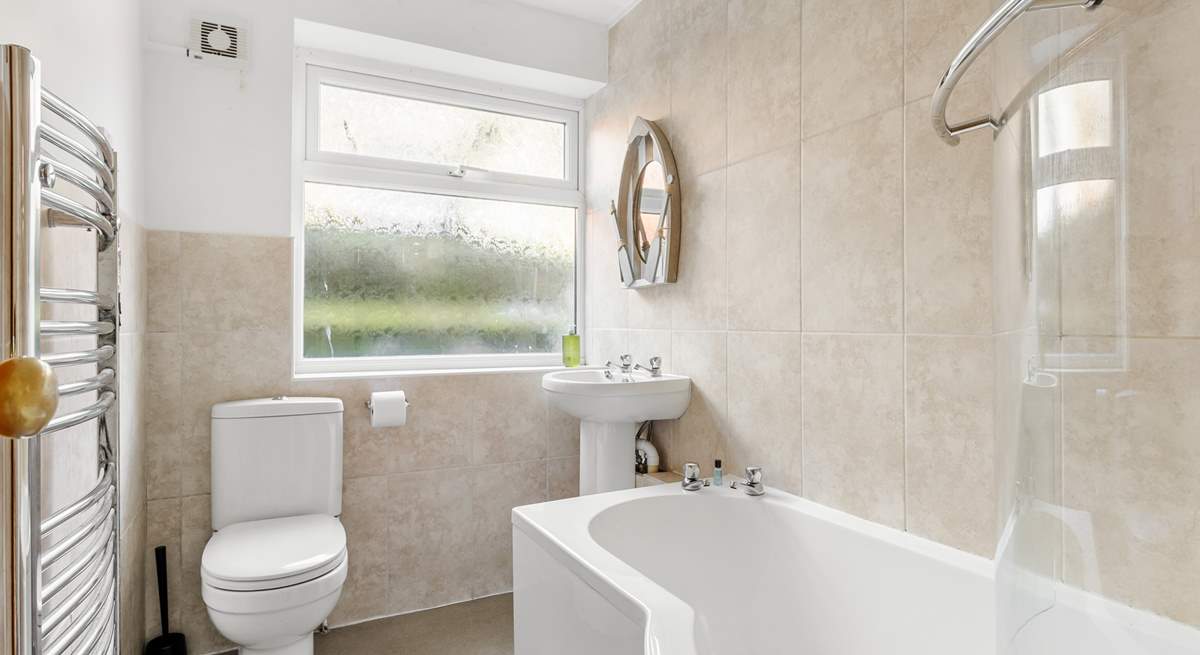 The family bathroom is on the ground floor and is complete with a heated towel rail.