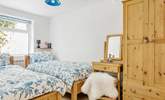 The twin room on the ground floor has solid wooden beds. - Thumbnail Image