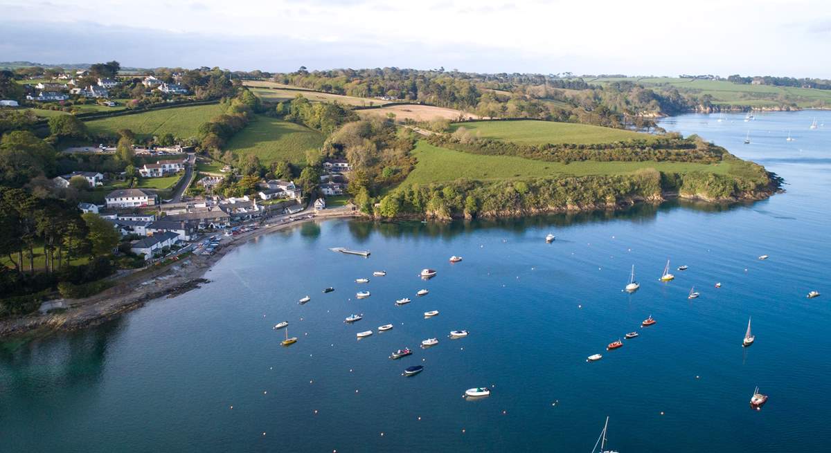 Watch the sailing boats come and go along the Helford river.
