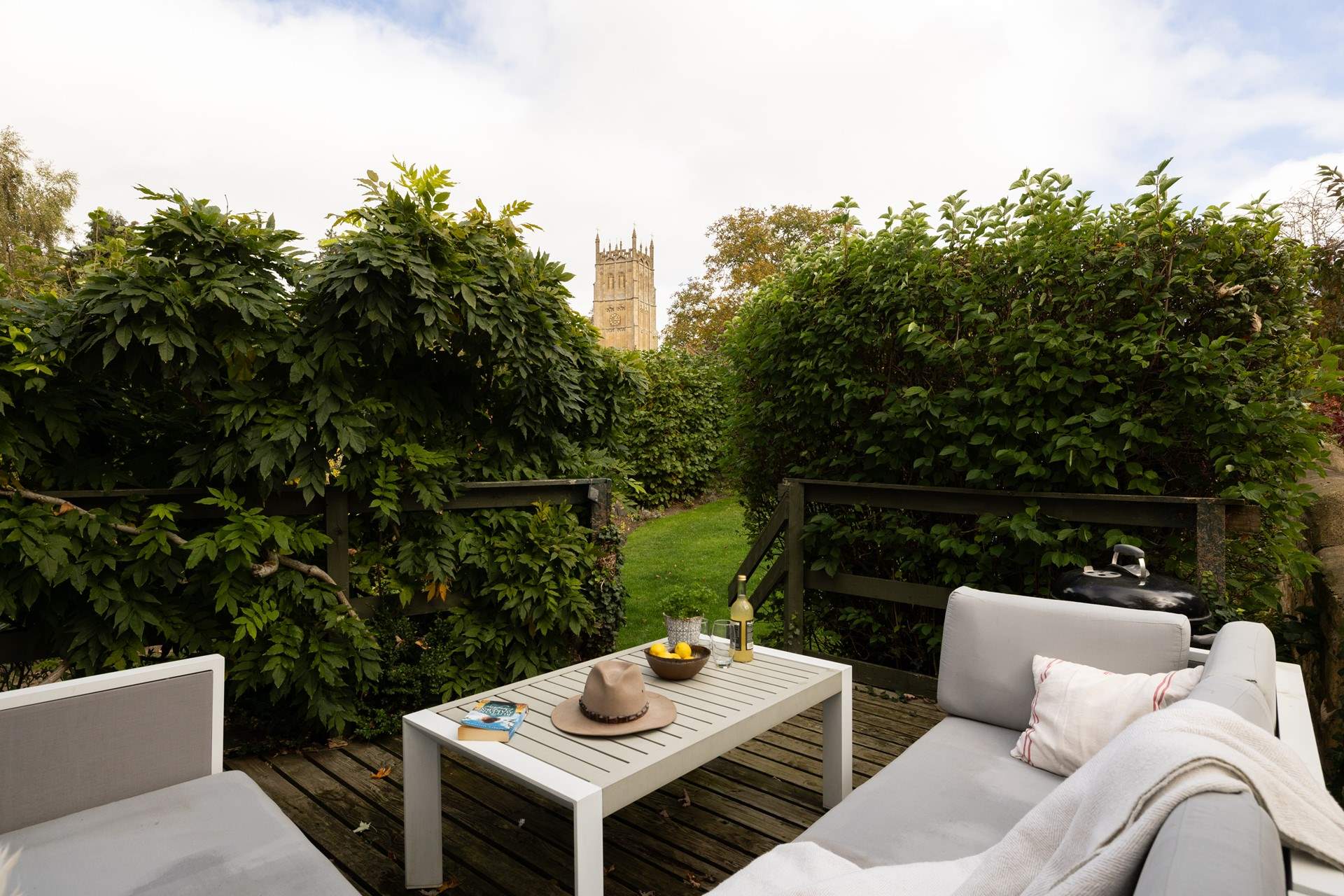 Sit in peaceful relaxation and gaze over the church tower.
