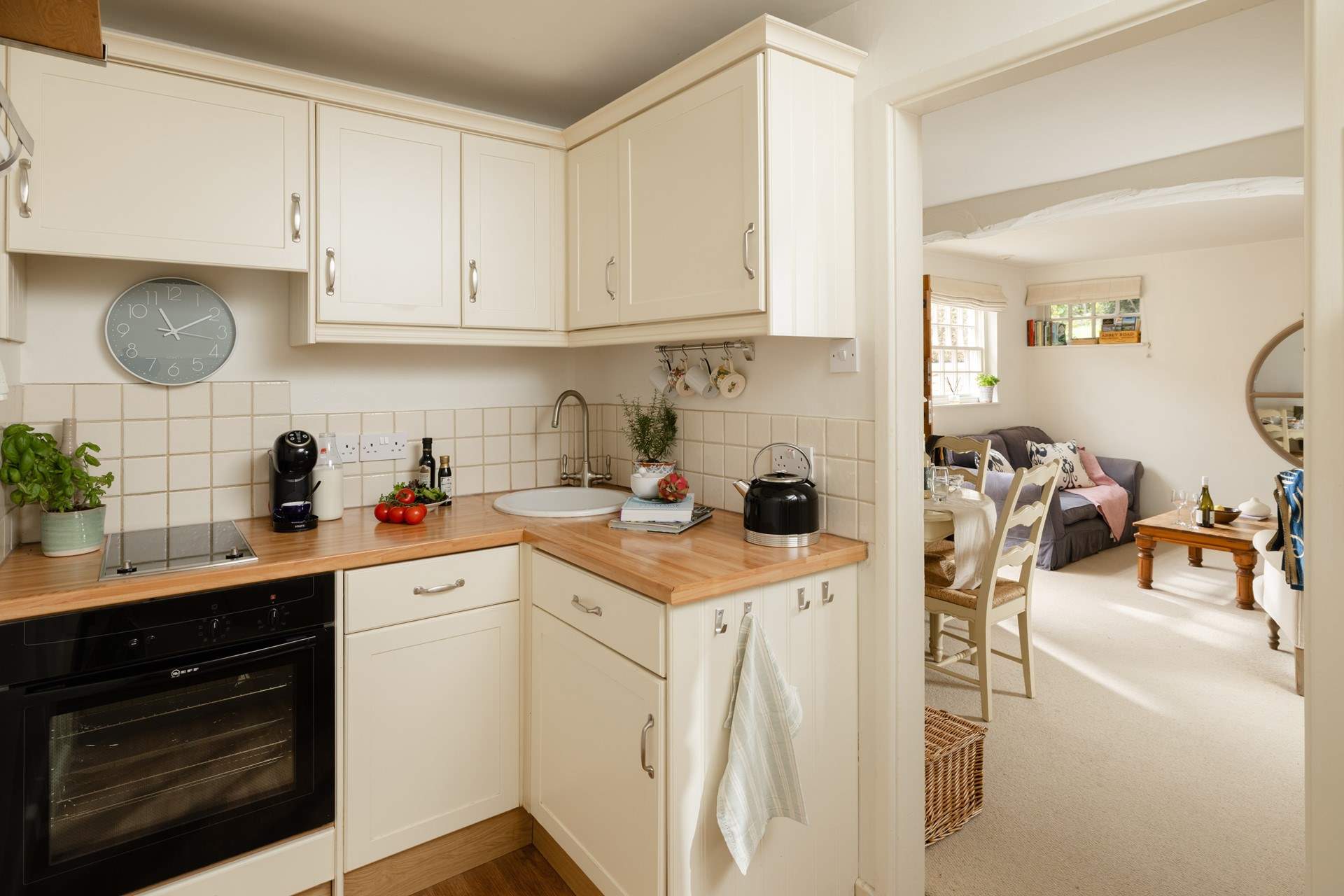 The kitchen is compact and has a two ring induction hob, all you need for a stay at the lovely Kettle Cottage. 