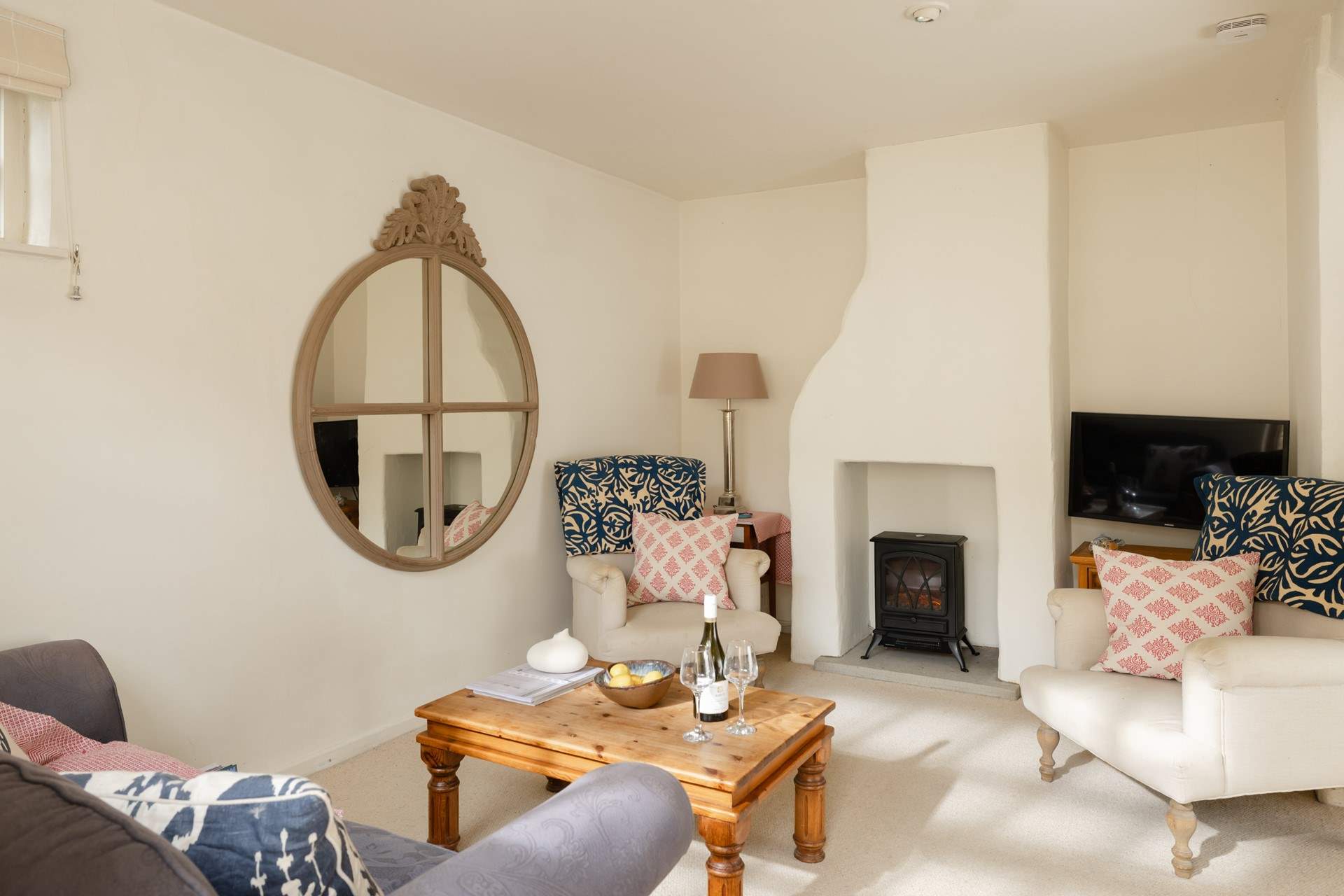 The pretty living-room is just the place for a relaxing evening.