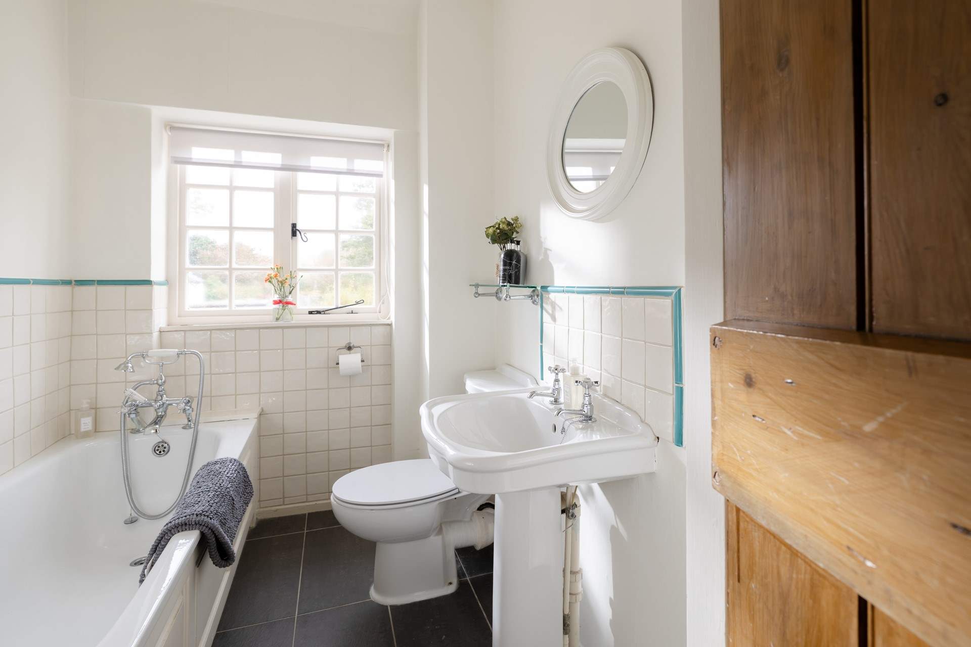 The bathroom for bedroom 2 sits next door to the bedroom.