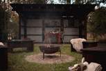 Gather around the dreamy fire pit and enjoy the unique dining area.