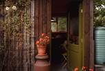 The self-contained kitchen sits just to the side of the tipi. 