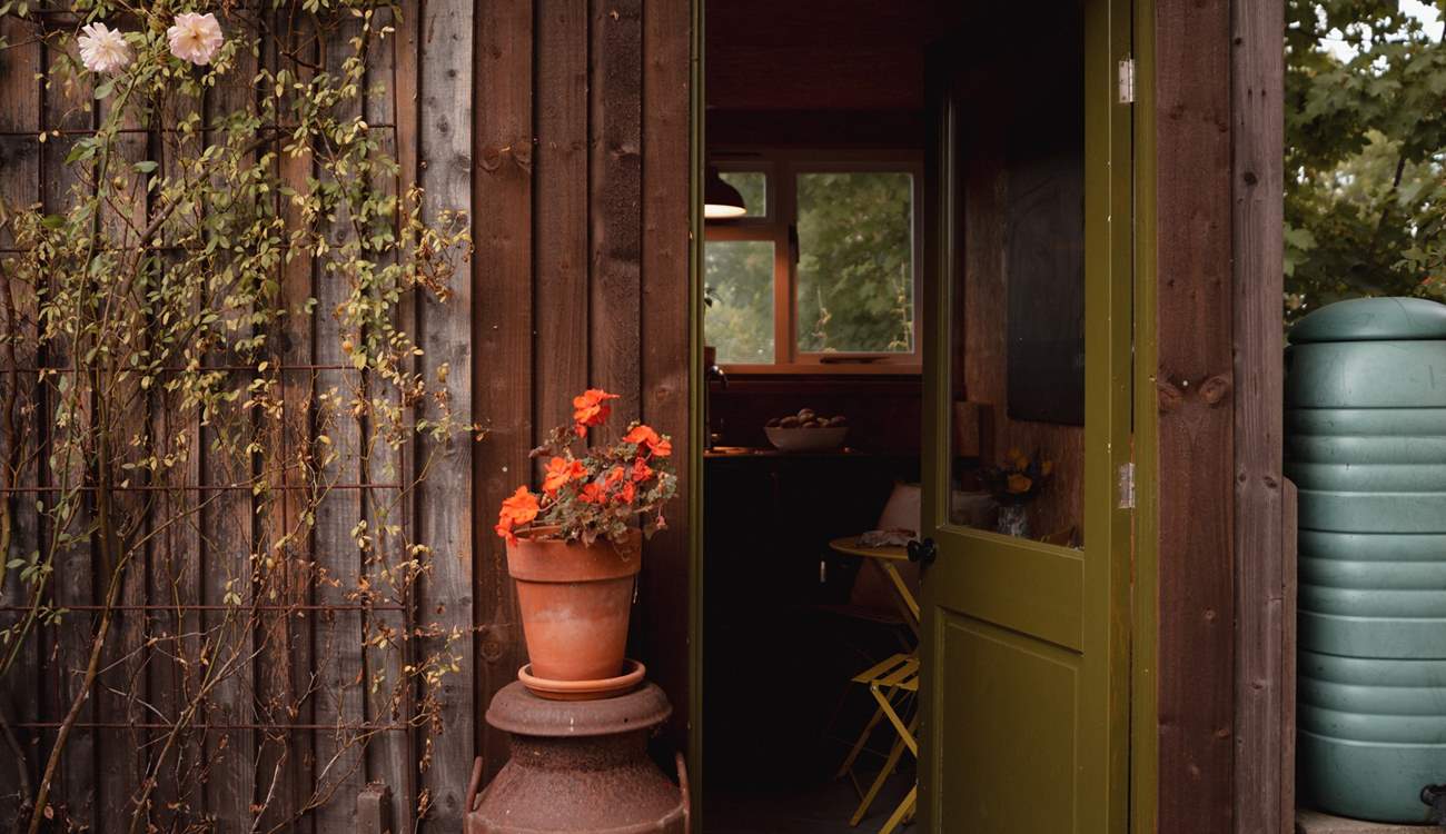The self-contained kitchen sits just to the side of the tipi. 