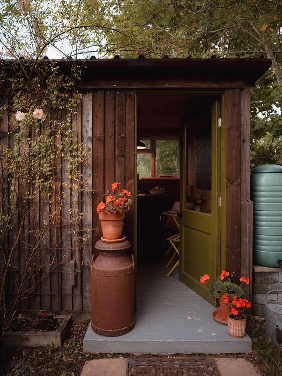 The self-contained kitchen sits just to the side of the tipi.