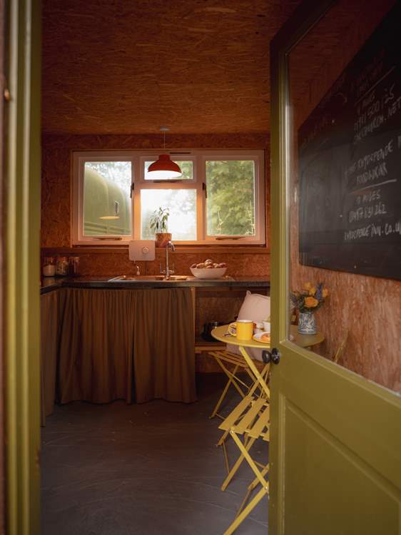 A sweet cooking and dining space.