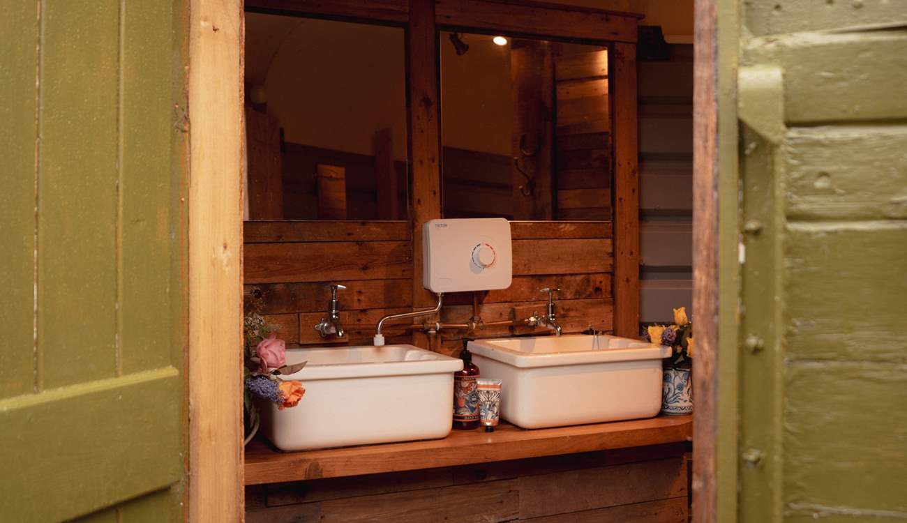 A private outdoor restroom sits to the rear of the tipi. *Please note this has now been upgraded to a wooden cladded bathroom. 