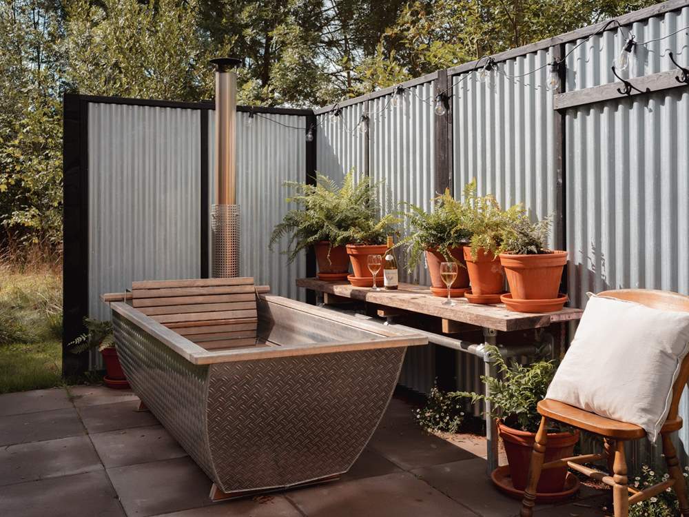 Soak up your surroundings in the soothing wood-fired outdoor bath.