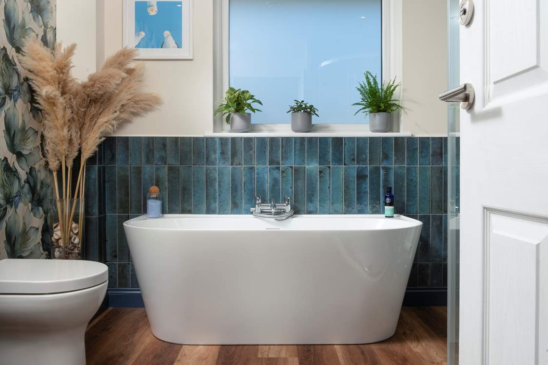 Soak away the day in the huge freestanding bath.