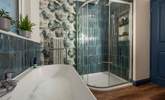 The family bathroom with elegant free-standing bath and invigorating shower, has been beautifully designed by the current owners. - Thumbnail Image