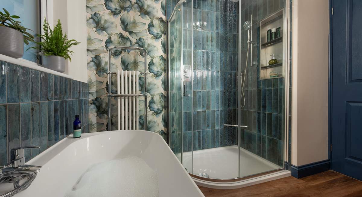 The family bathroom with elegant free-standing bath and invigorating shower, has been beautifully designed by the current owners.