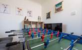 Family fun, in the sweet games-room, with multi games table and Smart TV. - Thumbnail Image