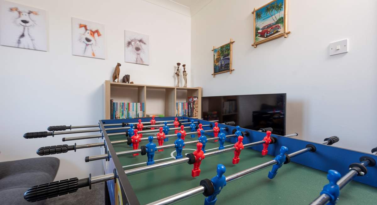 Family fun, in the sweet games-room, with multi games table and Smart TV.