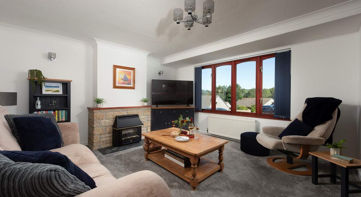 Cosy up in the sitting-room by the ornamental fire or unwind with your favourite shows on the Smart TV.