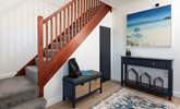 Step into the welcoming hallway. - Thumbnail Image