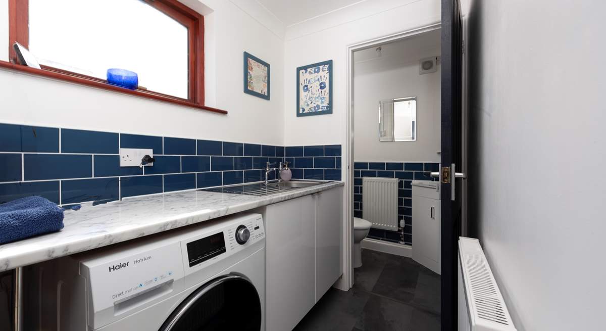 A utility-room with washing machine and tumble-drier as well as a handy cloakroom downstairs for your convenience.
