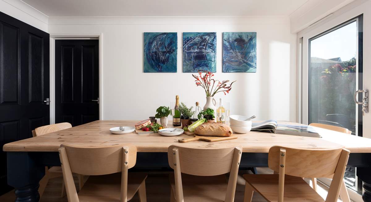 Gather round and plan your day's adventures in the spacious dining-area.
