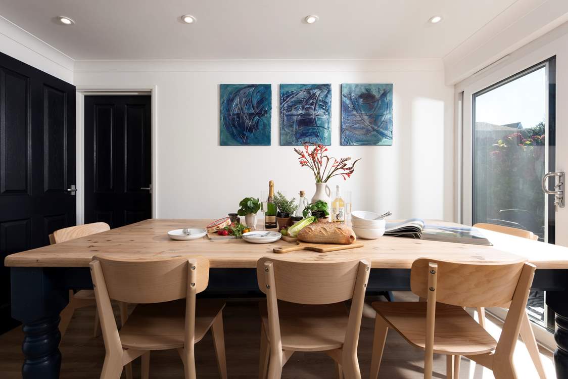 Gather round and plan your days adventures in the spacious dining area.