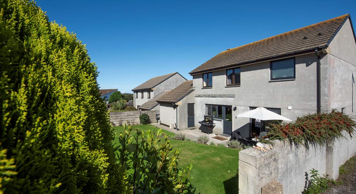 Relax in the sweet garden, perfect for sunny afternoons.