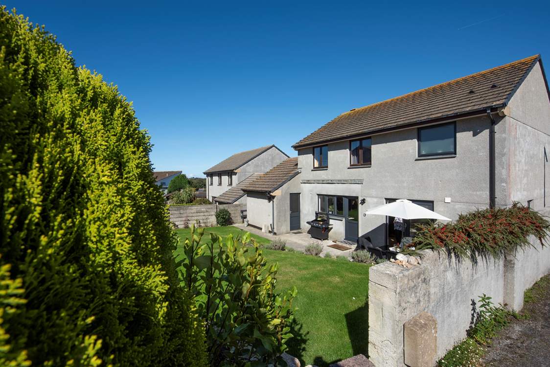 Relax in the sweet garden, perfect for sunny afternoons.