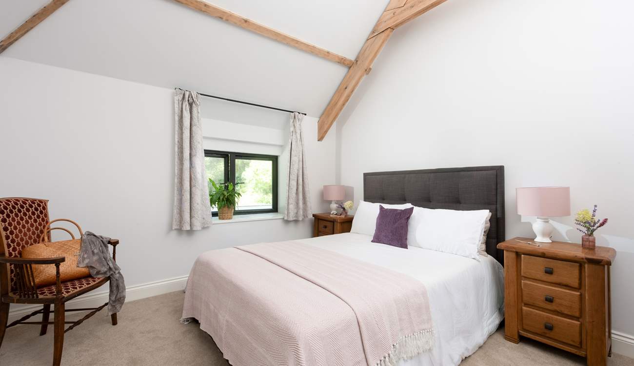 A king-size bed awaits in bedroom 1.