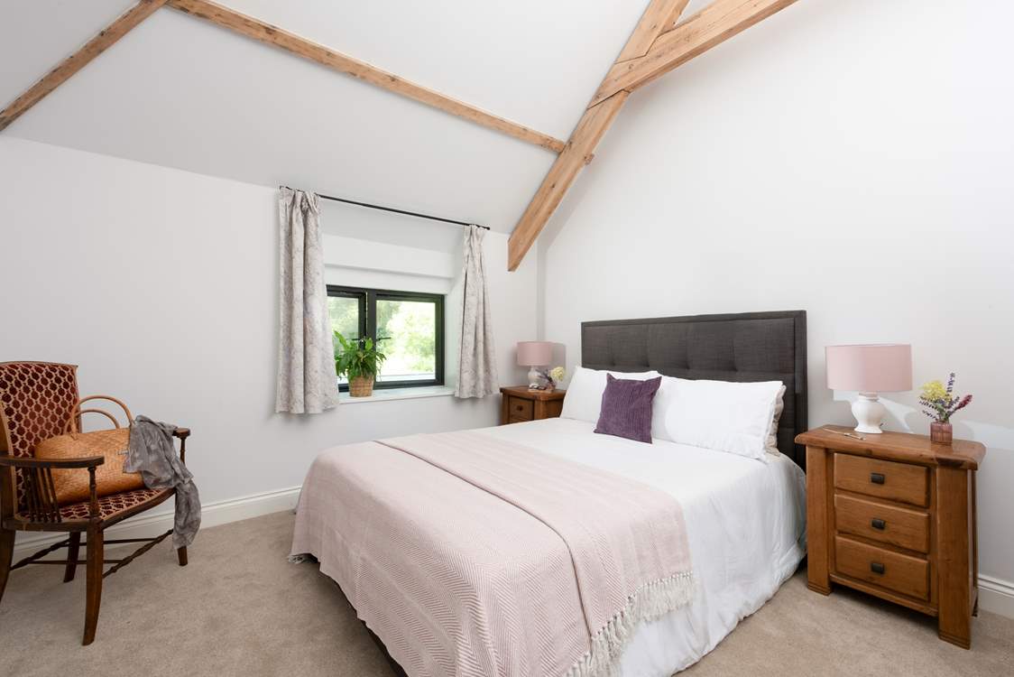 A king-size bed awaits in bedroom 1.