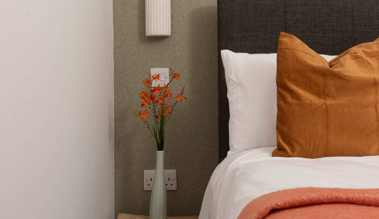 The tones perfectly complement the woodland setting.